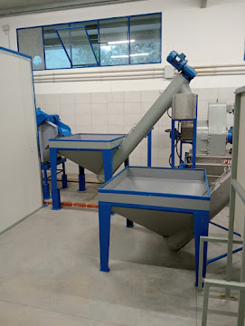 Tramogge di carico e coclea per le olive